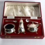 An Elizabeth II silver 3-piece cruet set, maker's marks for Copper Brothers & Sons Ltd, in