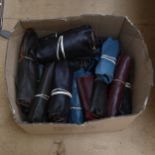 A large quantity of various rolls of leather