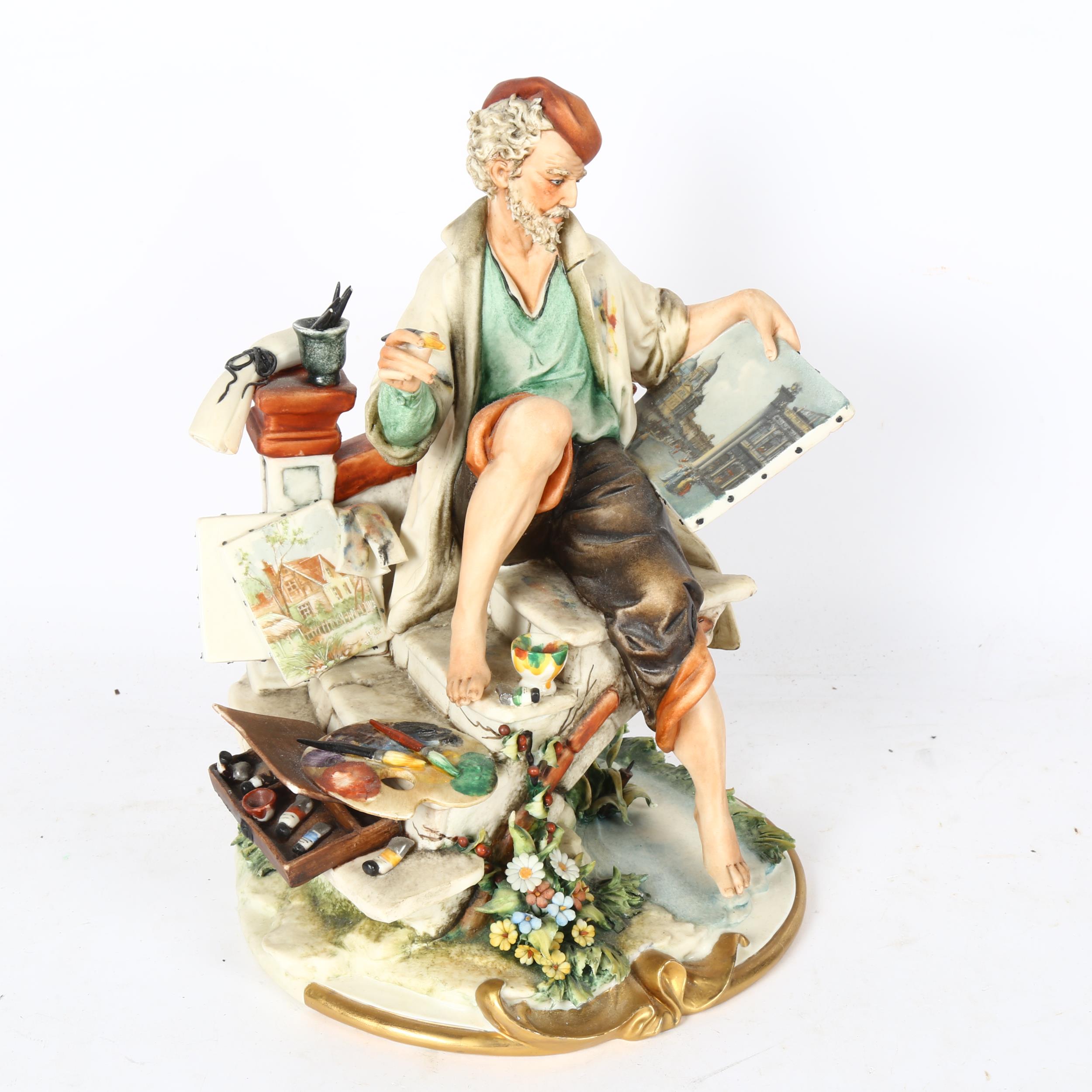 A Capodimonte artist painting a Venetian scene, 26cm