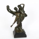 A reproduction patinated bronze figural sculpture, Classical man and lady dancing, signed