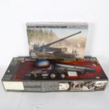 A Revell Beall tank trailer model kit, 1:24 scale, kit no. 07554, and a Hobby Boss 1:72 scale German