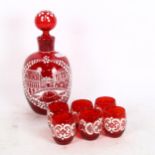 Bohemian overlay decanter and shot glasses, ruby red in colour and decorated with a Venetian scene
