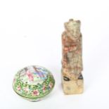 A Chinese soapstone standing figure, height 13cm, and a small enamelled metal pot, diameter 6cm (2)