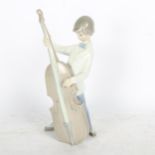 Lladro boy with cello, 22cm