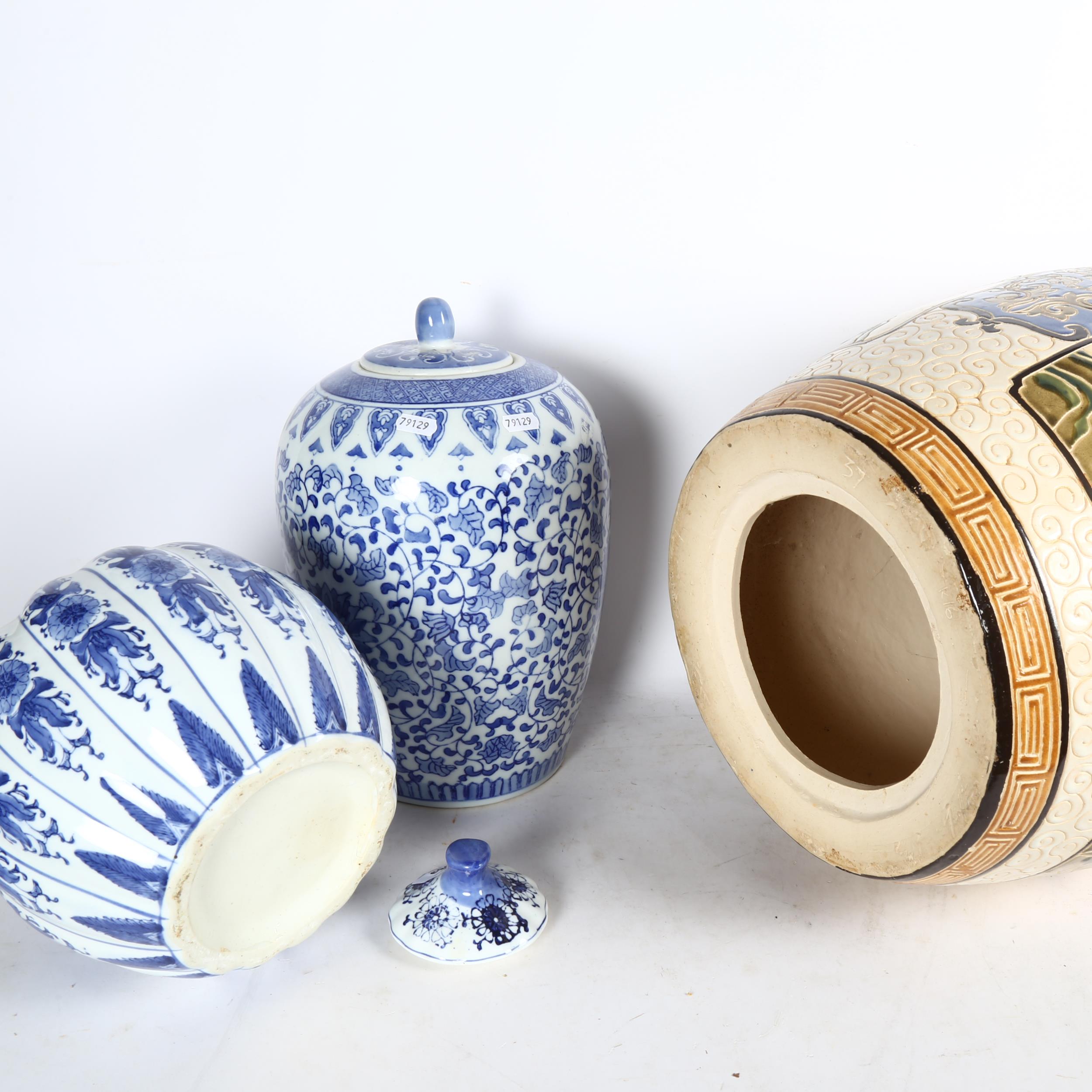 A ceramic Oriental garden seat, 42cm, and 2 blue and white jars and covers - Image 2 of 2