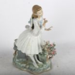 Lladro sculpture of a young girl with flowers, on plinth, 29cm