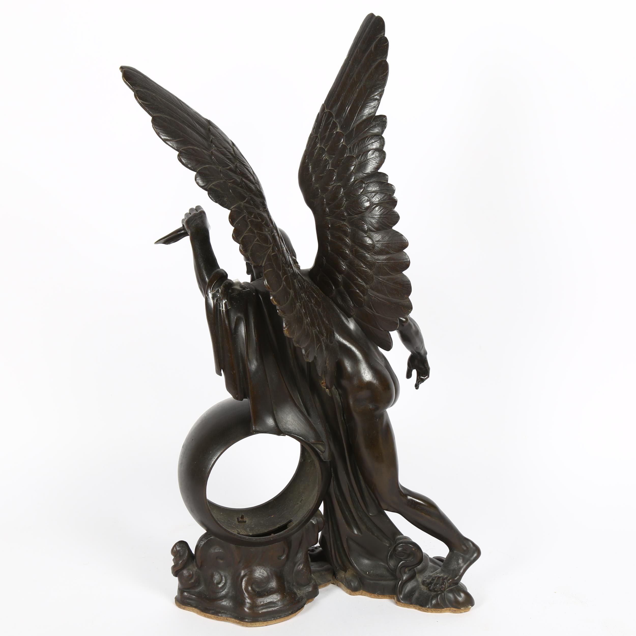 A large 19th century patinated bronze figural sculpture clock case, winged Chronos (God of time), on - Image 2 of 2