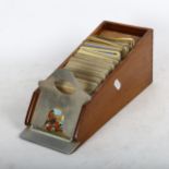 A mid-20th century mahogany card playing shoe and cards, length 38cm