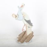 Lladro stork and baby on a chimney pot, 6228, 25cm