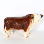 A large porcelain bull, height 26cm