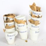 A group of unused and unpacked 1960s Horlicks mugs