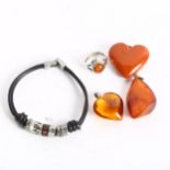3 amber pendants, and a silver and amber mounted ring, charm bracelet etc