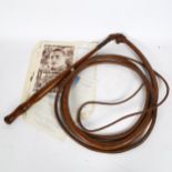 An Australian mahogany and kangaroo leather stock whip, with handwritten letter from Holman James (