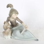 Lladro girl with dog reading a book, height 14cm, 5475