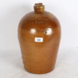 An Antique stoneware flagon, engraved Webb Whitechapel London, Fulham Stone Pottery, height 38cm