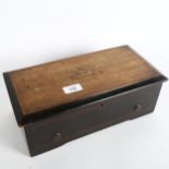 A 19th century Swiss marquetry inlaid musical box, playing a 15cm cylinder, case length 35cm Case is