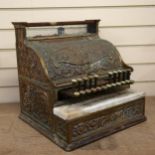 A National cash register, relief embossed brass fleur-de-lis decoration, with white marble change