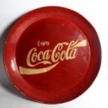 A modern painted aluminium circular tray, embossed Coca Cola, diameter 53cm