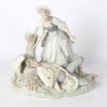 Lladro bisque porcelain group of a shepherd and girl with sheep, on naturalistic plinth, height 27cm