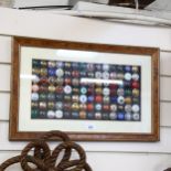 A collection of 98 Champagne bottle tops, mounted in single frame, to include Champagne Bruno