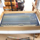 A Behringer 32-channel mixing desk with separate power source, rack mountable, in good working