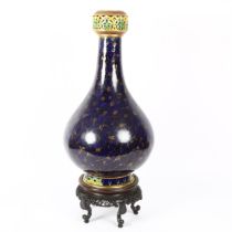 MINTON - a large gilded blue glazed Persian bottle vase, with reticulated neck and square pierced