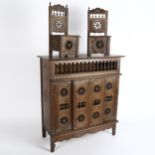 An Antique Continental Folk Art table-top cabinet, with 2 sliding doors and allover turned