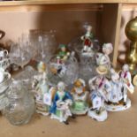 A large glass punch bowl and carver, fruit bowls, vases, goblets, various Continental figures etc