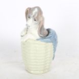 Lladro porcelain dog in basket figure, height 19cm