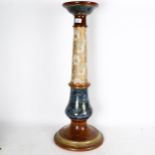 A Doulton stoneware floor standing jardiniere stand, height 77cm
