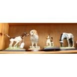 4 Doulton animals on separate plinths, comprising Pointer, Barn owl, hound and Appaloosa, boxed