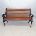 A stained teak slatted garden bench, with cast-iron ends, L123cm