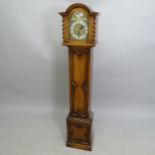 An oak-cased dome-top grandmother clock, with brass face, 31cm x 144cm x 21cm