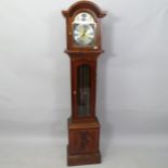 A reproduction mahogany 8-day grandmother clock, complete with pendulum and weights, case height