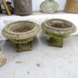 A pair of weathered concrete 2-section garden urns, 56cm x 45cm x 55cm