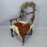 A modern resin antler chair, overall 64cm x 120cm x 60cm