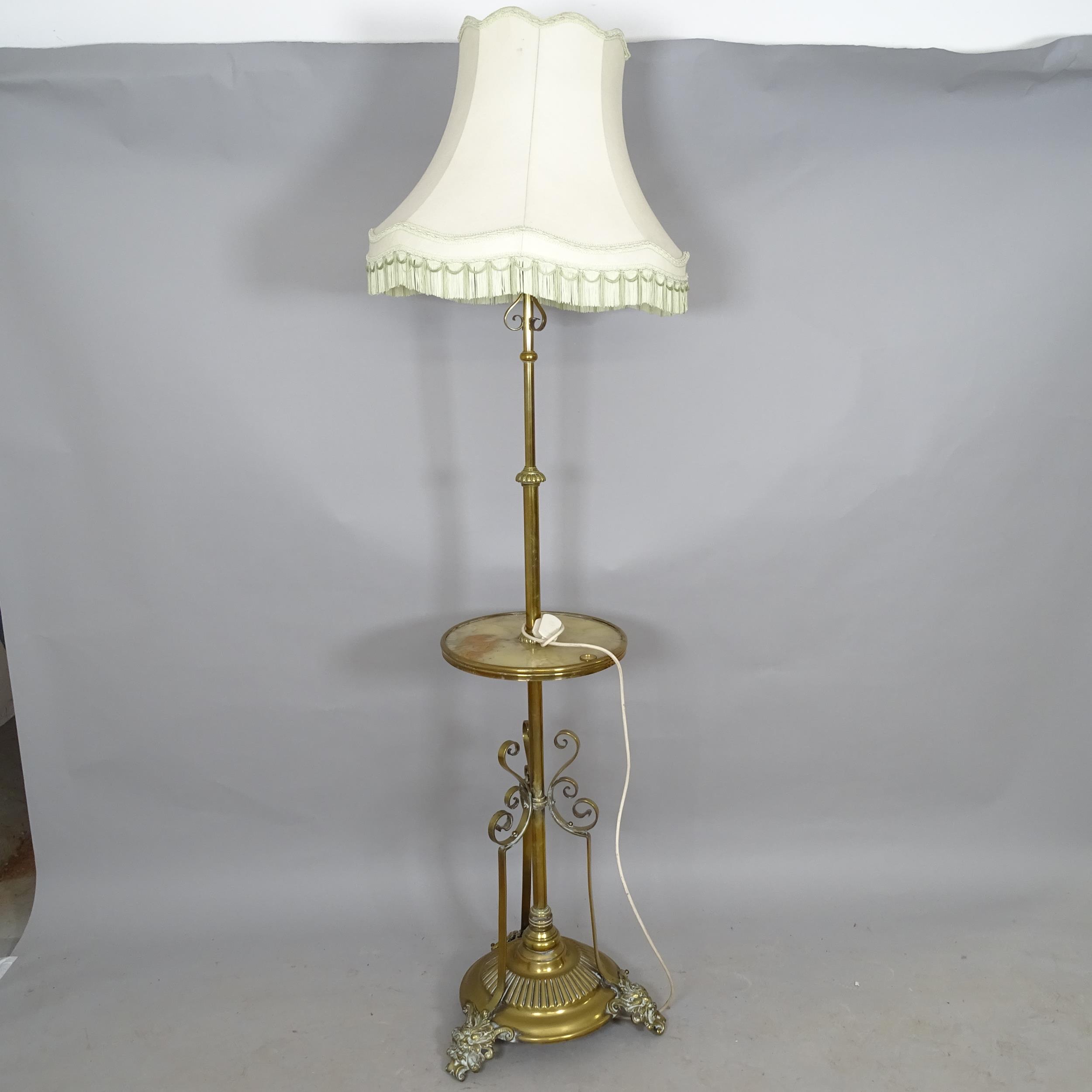 A Victorian brass telescopic standard lamp, converted to electric, lowest height to bayonet, 160cm