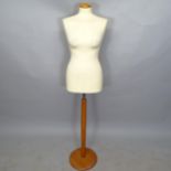 A female shop display mannequin on stand, H154cm