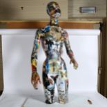 A decoupage decorated abstract 3/4 size mannequin, on board stand, figure height 115cm