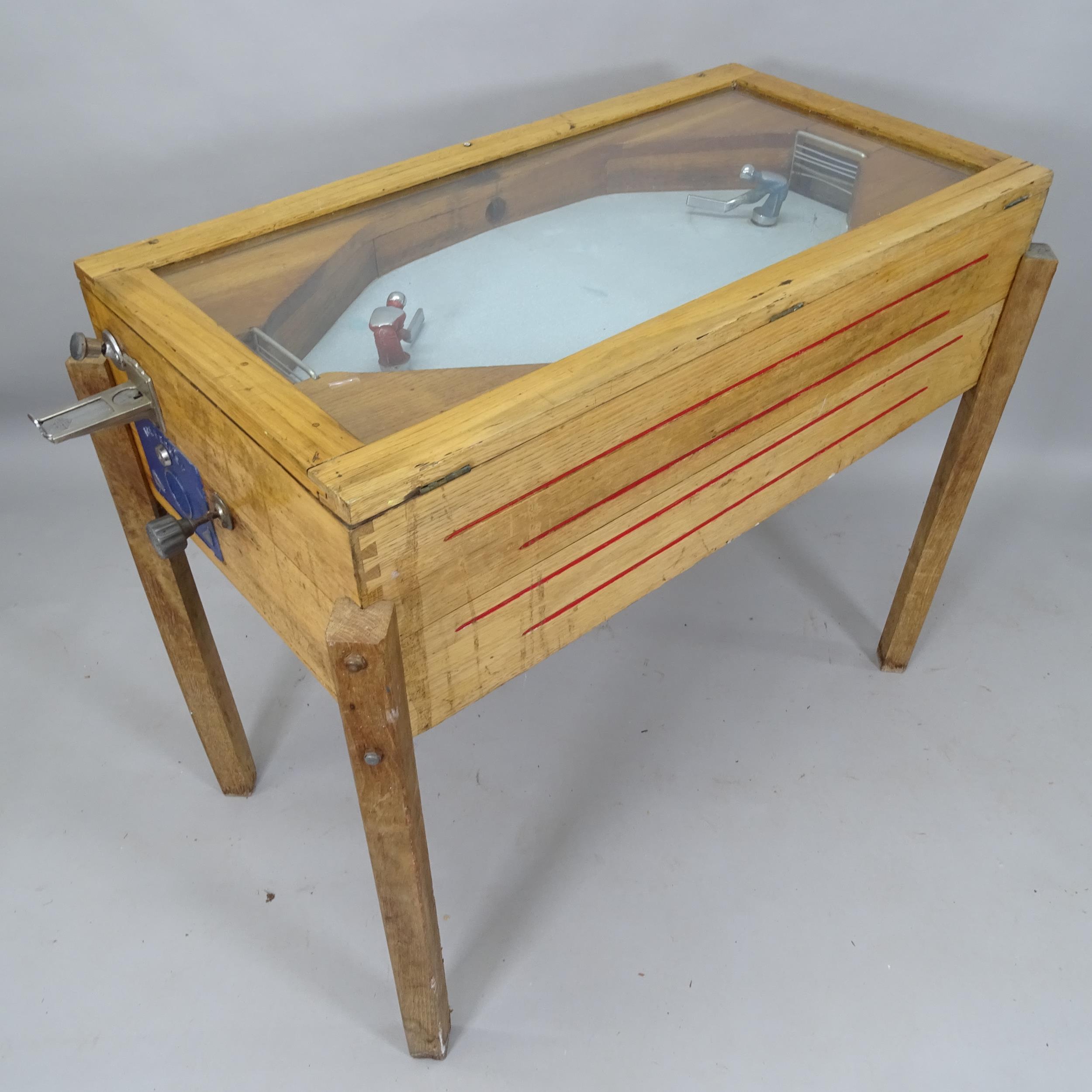 Ruffler & Walker ice hockey amusement arcade machine circa 1950, oak case, case dimensions 105cm x