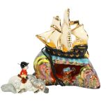 Continental pottery nursery lamp in the form of a galleon at sea, 23cm, and a Beswick Thelwell "Kick