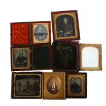 A collection of 19th century ambro and daguerrotypes, 2 in folding leather cases (6)