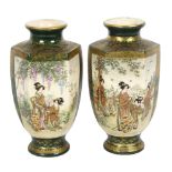 A pair of Japanese green ground Satsuma panel vases, with figural decoration and signed to the base,
