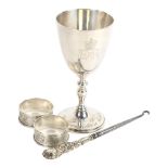 An Elizabeth II silver goblet, 2 silver napkin rings, and a silver-handled button hook