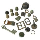 A collection of Archaic and other metalware finds, including miniature spur, thimbles, buckle etc