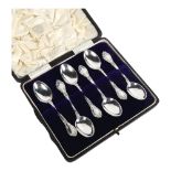 A set of 6 American silver teaspoons, with import marks for Birmingham 1909, cased