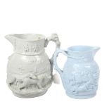 A Victorian Mason's moulded jug with hound decoration, height 25cm, and a Victorian jug with wild