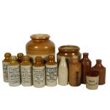 A group of stoneware bottles, including R Whites Ginger Beer, Halley's Beer etc. tallest 16.5cm