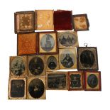 A collection of Victorian ambrotypes, daguerrotypes and tintypes, some leather-cased (12)