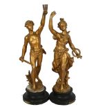 A pair of French gilded spelter figures, Victoire & Glorie after Bruehon, tallest 52cm